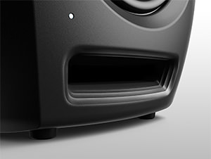 Front-loaded bass reflex port with grooves Front-loaded bass reflex port with grooves